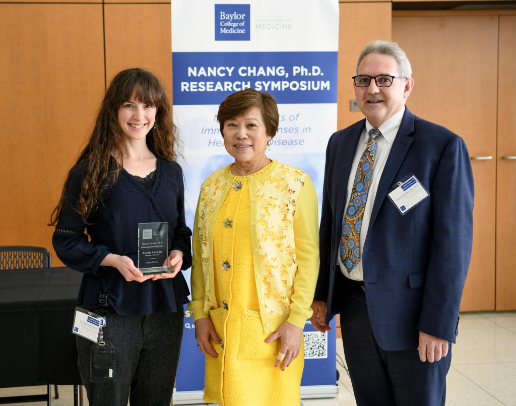 Dr. Nancy Chang (middle) and Dr. Rolando Rumbaut (right) awarding Ms. Dominique Armstrong 1st place in the 2023 Nancy Chang, Ph.D. Poster Session