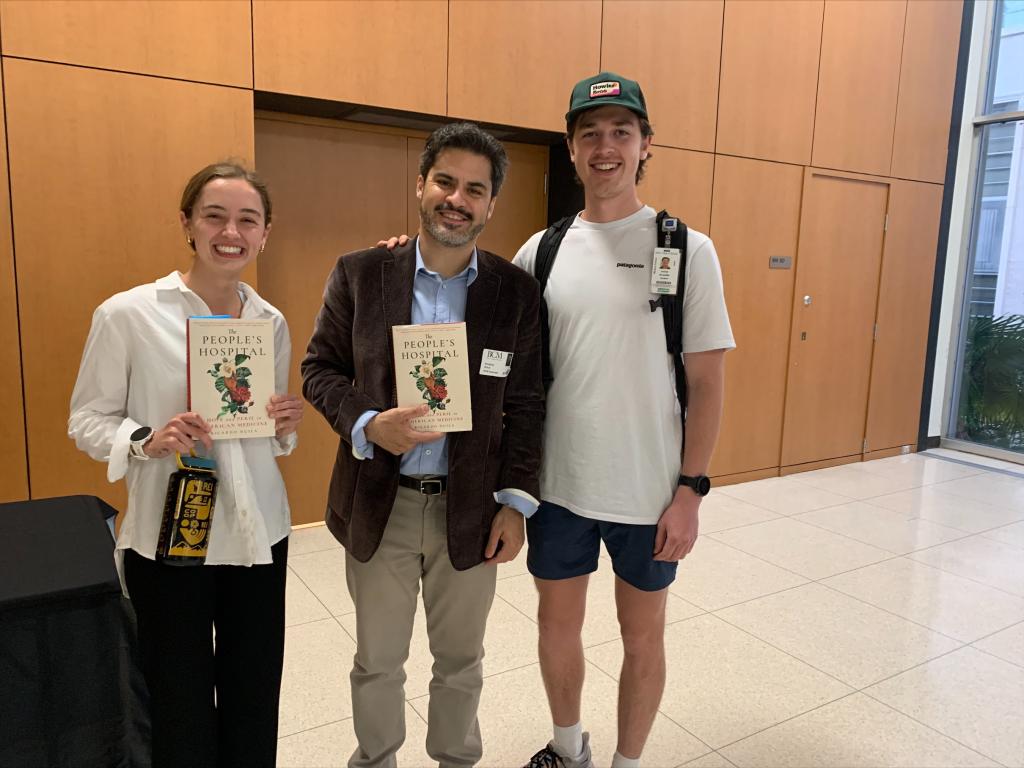 BCM Students pose for a picture with Dr. Nuila after getting their copies signed