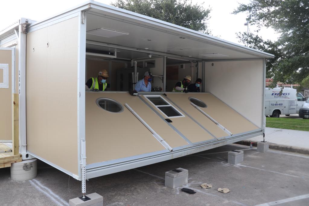 A Smart Pod in mid-deployment, with one wall being pushed up