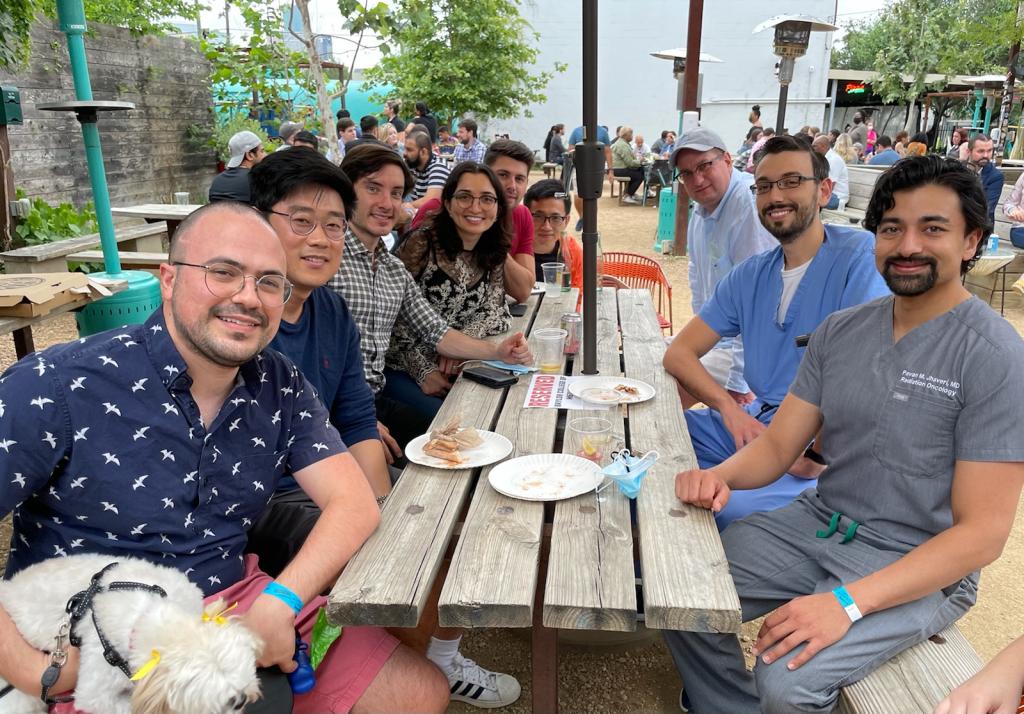 residents smiling at an outdoor hangout