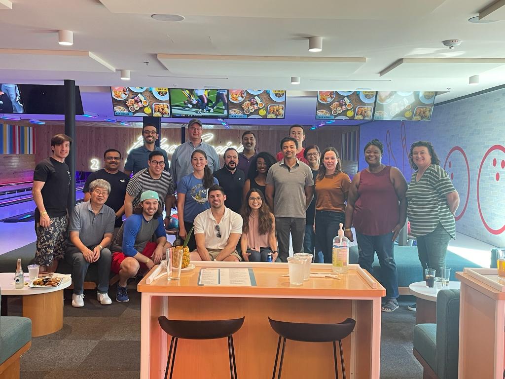 residents smiling at a bowling alley