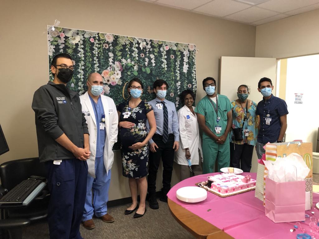 residents celebrating their teammate's pregnancy