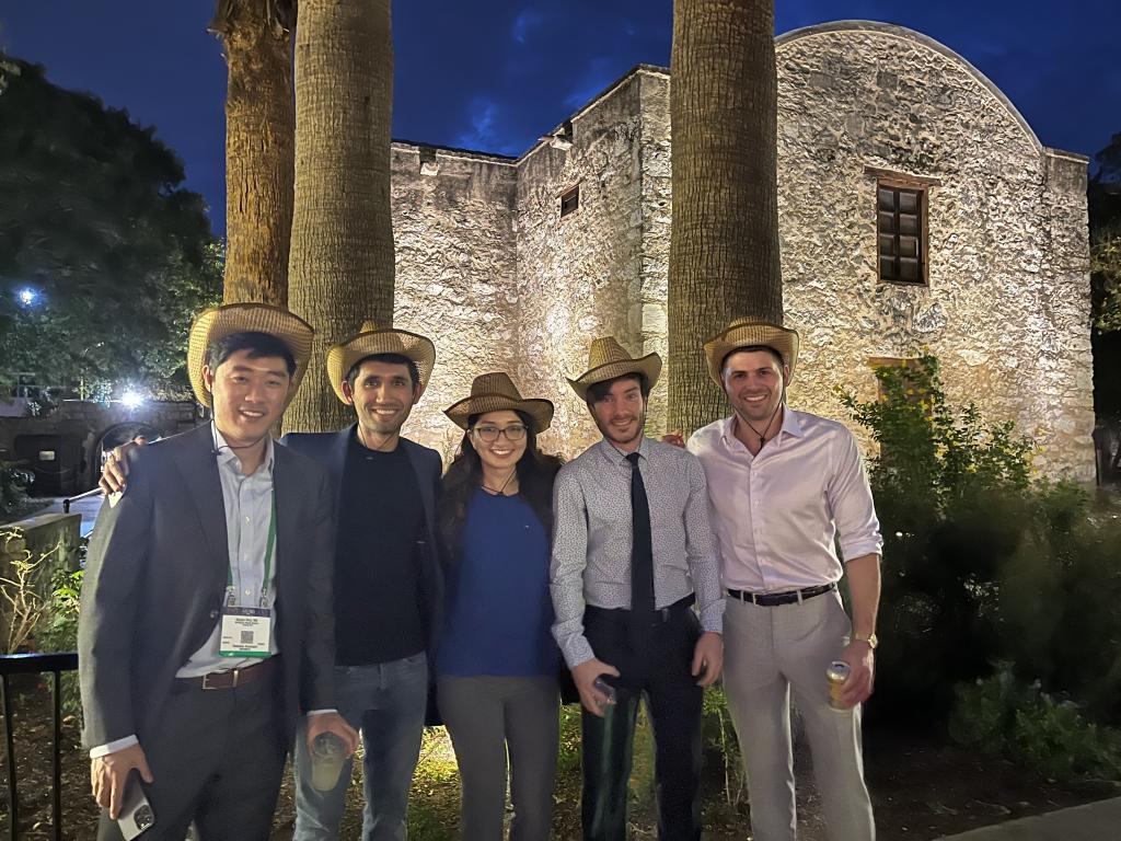 residents at a historical site smiling