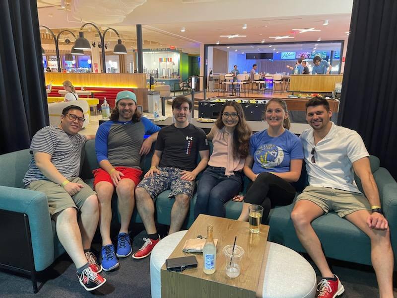 group of residents smiling while sitting down