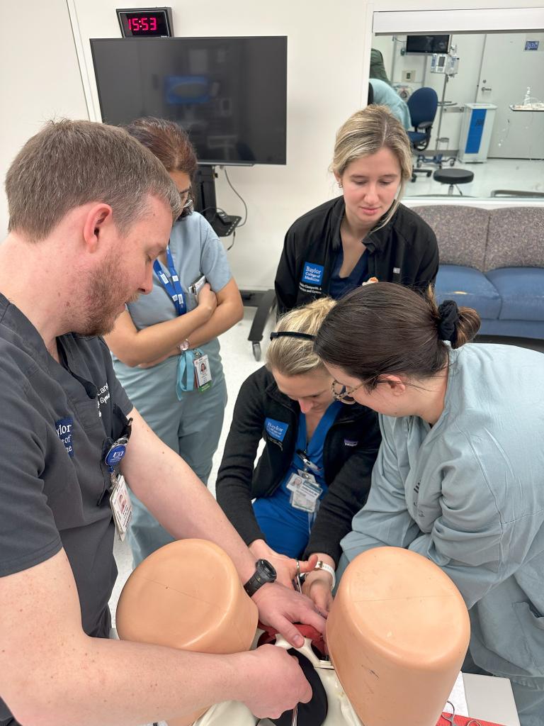 OB/GYN residents performing a mock birth