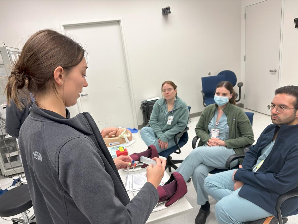 ob/gyn residents listening to instruction