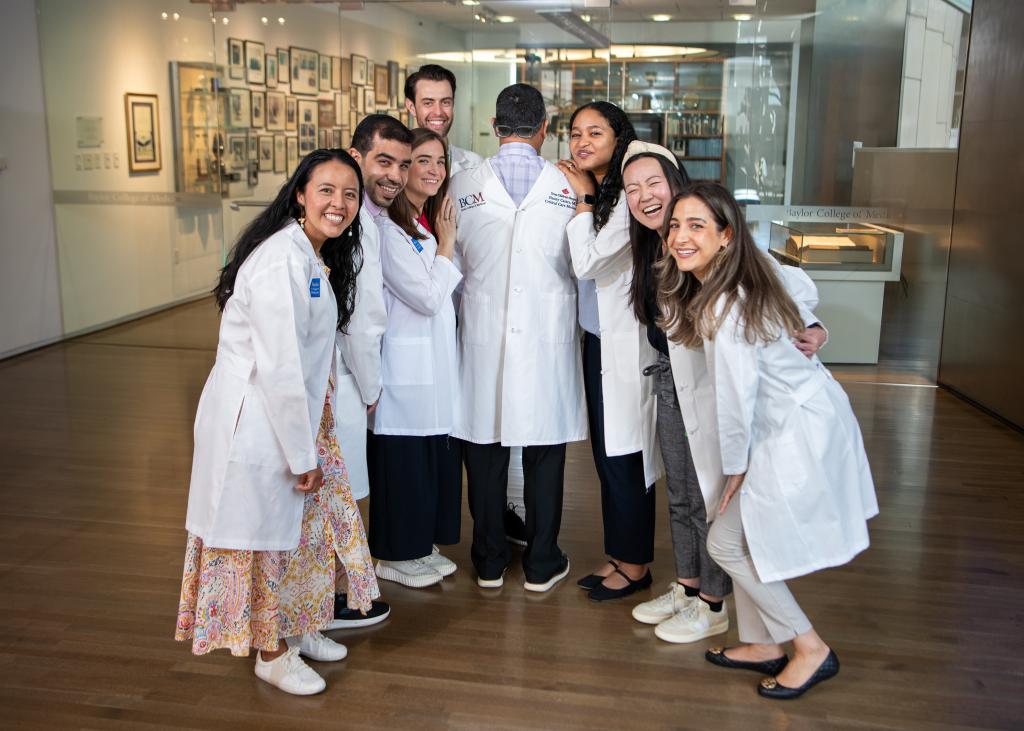 a group of doctors being goofy for a photo
