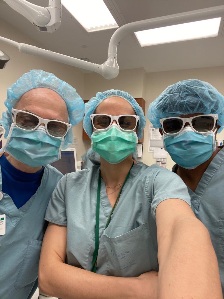 3 doctors in scrubs and face masks