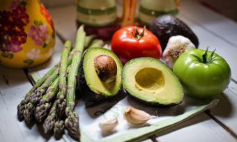 Photo of avocado and other raw vegetables