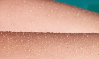 Close up photo of sweat on skin.