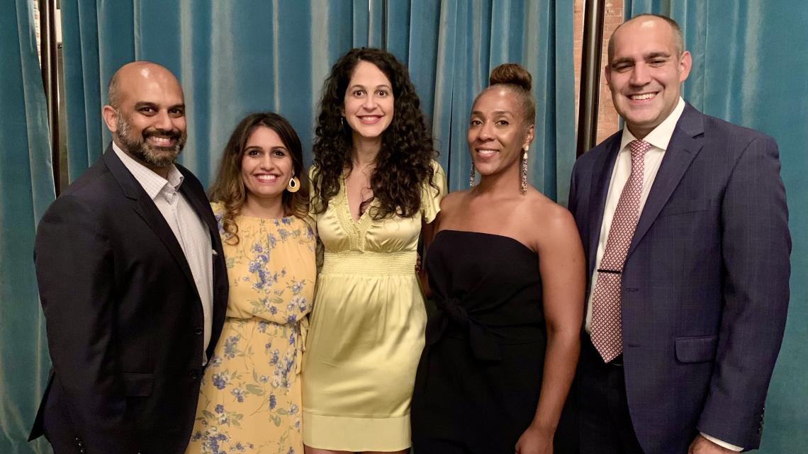 Dr. Anoop Agrawal, Dr. Wajeeha Hussain, Dr. Elisha Acosta, Dr. Frene Lacour-Chestnut and Dr. Jaime Rueda stand posed in a row while dressed in formal wear.