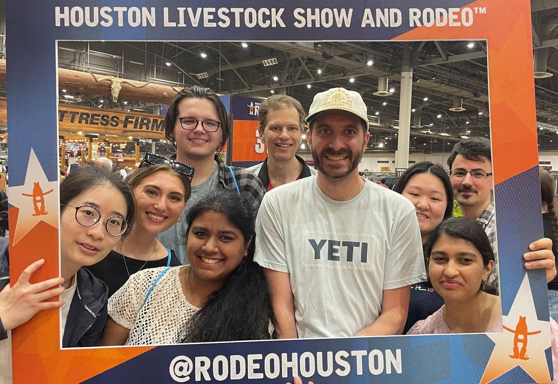 group of people posing at the houston rodeo