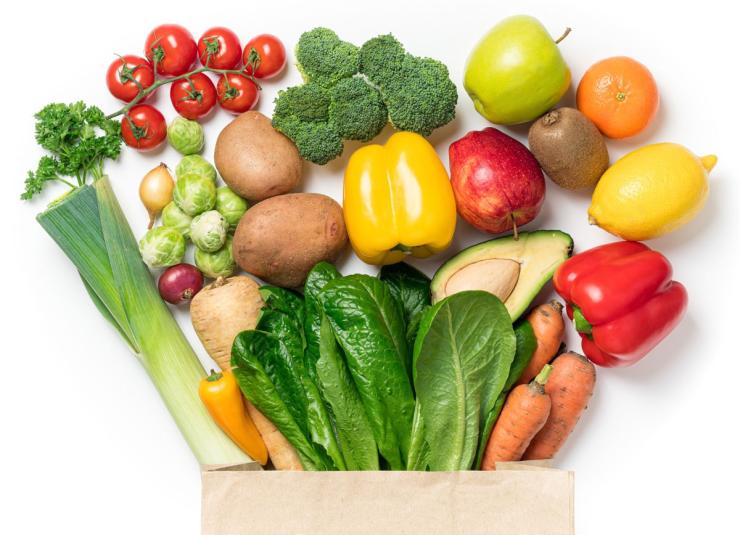 Fruits and Vegetables Fruits and vegetables in a grocery bag.