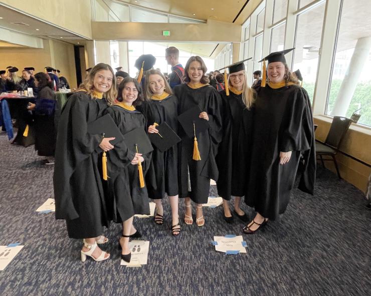 A group of Genetic Couseling students gather before the BCM 2023 commencement ceremony.