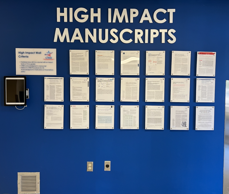 Photo of CTRID-High-Impact Manuscripts on a wall