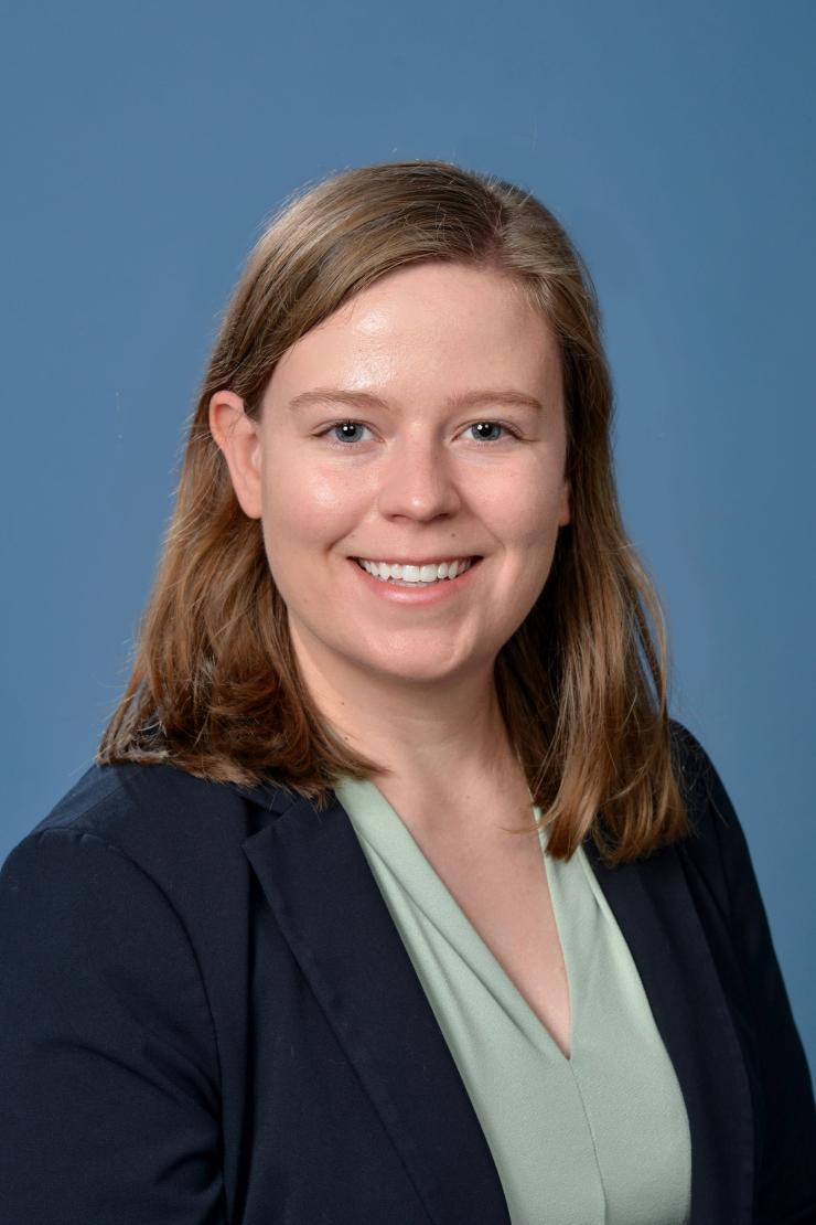 woman with shoulder length hair smiling