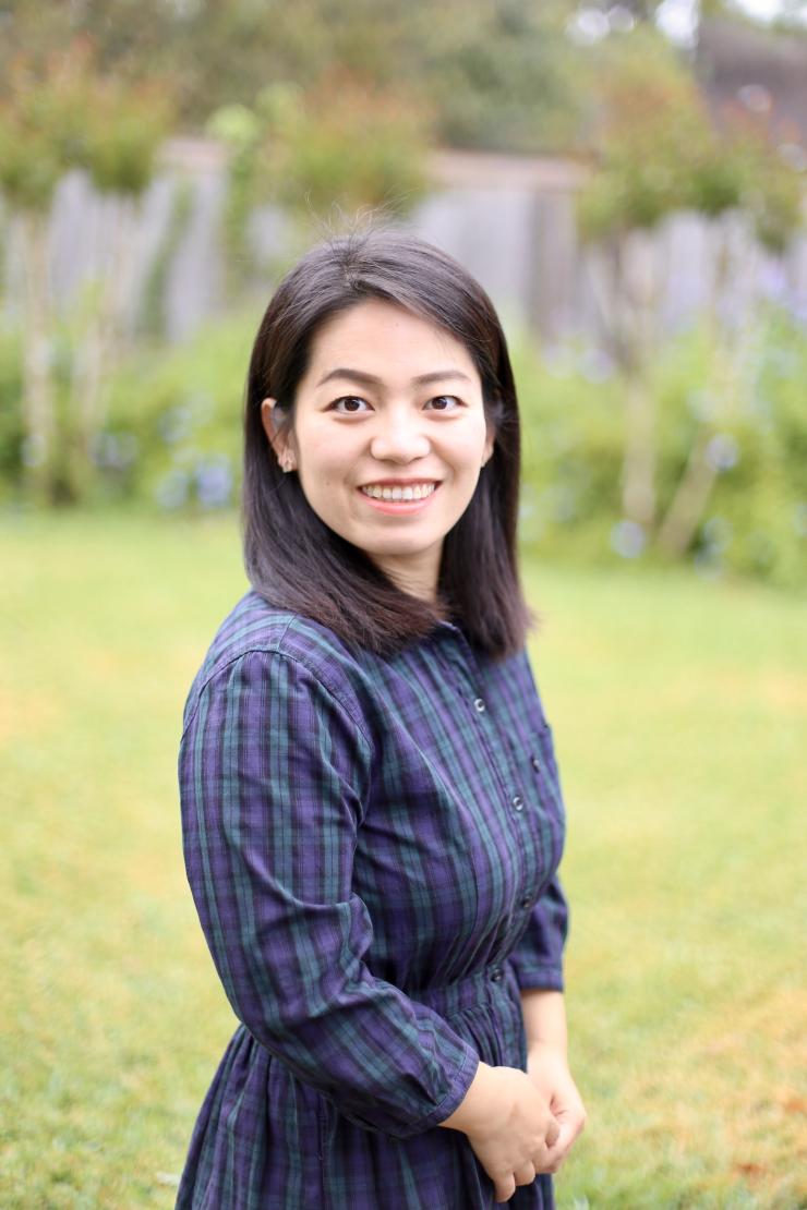 woman smiling outside