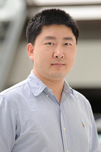 Dr. Jin Wang, associate professor of pharmacology and chemical biology and of molecular and cellular biology
