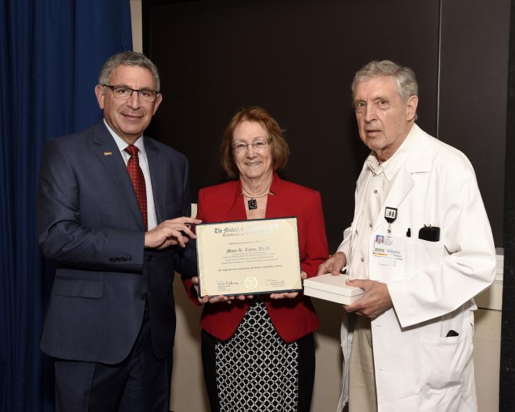 Dr. Mary K. Estes with Drs. Paul Klotman and George Noon