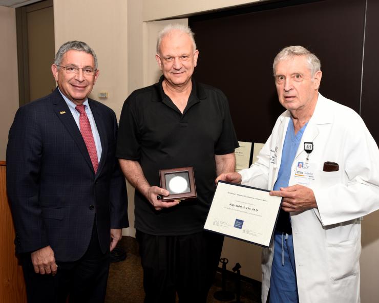 From left to right: Dr. Paul Klotman, Dr. Hugo Bellen and Dr. George Noon