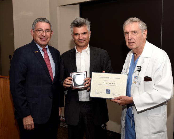 From left to right: Dr. Paul Klotman, Dr. Andreas Tolias and Dr. George Noon