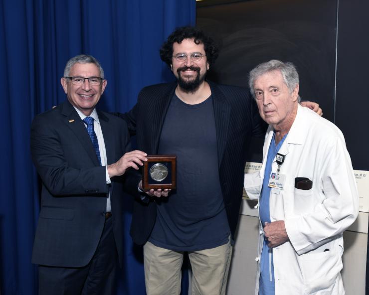 Dr. Lieberman with Drs. Klotman and accepts the 2018 DeBakey award.