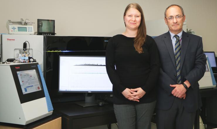 Dr. Anna Malovannaya and Dr. Matthew Ellis in the mass–spectrometry lab at Baylor College of Medicine.