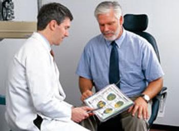Candidate for laser vision correction Doctor and patient discuss laser vision correction
