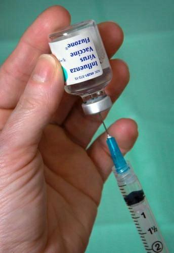 Image of a vial of influenza vaccine.