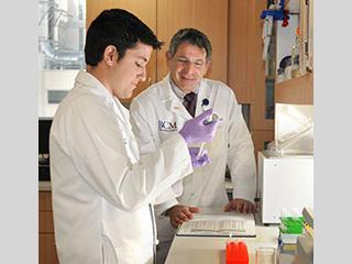 Klotman Laboratory Dr. Paul Klotman with a colleague in the laboratory