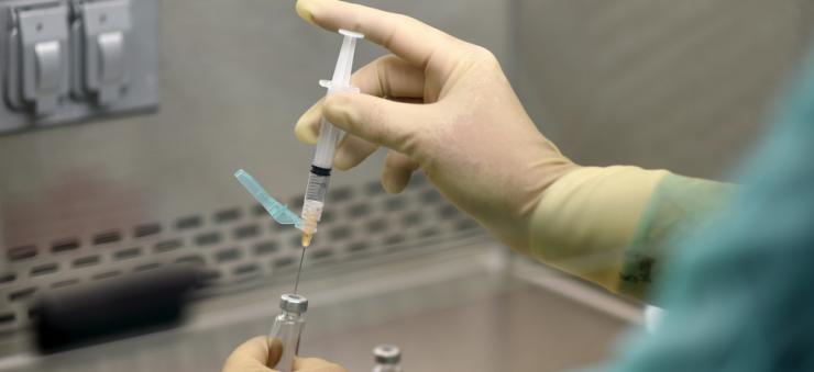 Vaccine lab research Researcher in a vaccine testing lab