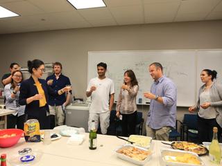 Lab members celebrate after Wenyi defends her thesis.