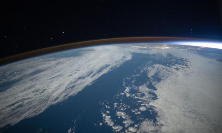 Photo taken from the ISS of Earth's horizon during an orbital sunset near California.