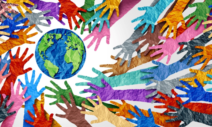 Illustration of hands of many colors reaching toward a globe of the earth.