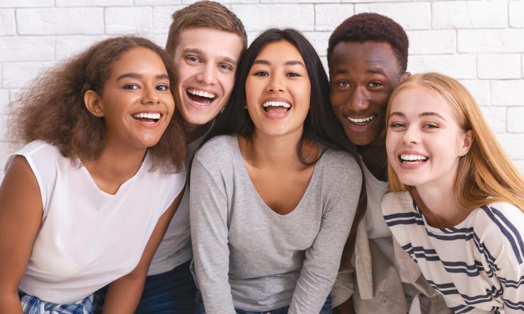 diverse group of young people smiling