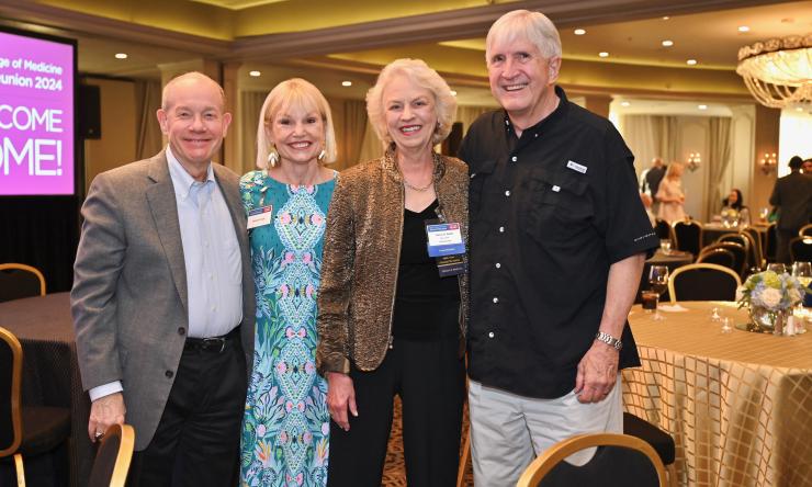 Group of four BCM alumni gathered at the last reunion