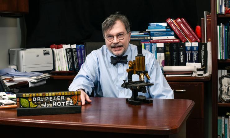 Dr. Peter Hotez sitting at his desk