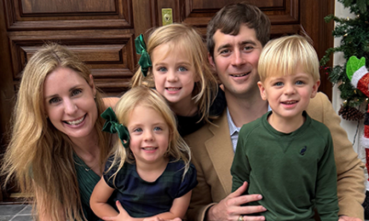 Photo of a family sitting on a porch during Christmas - Empower Blades