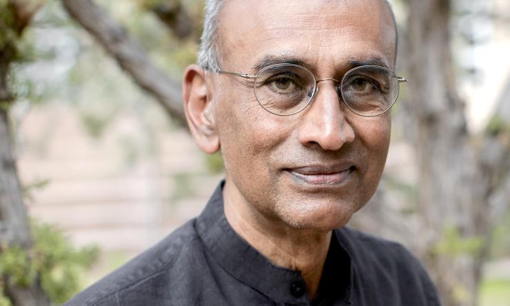 man with glasses on smiling