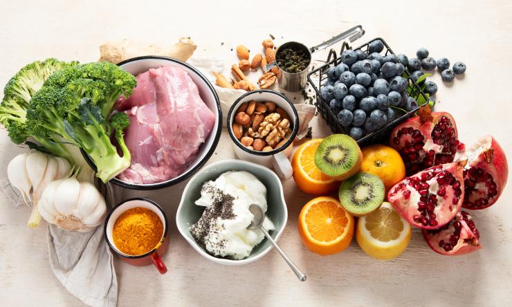 various fruits, veggies, and raw meat