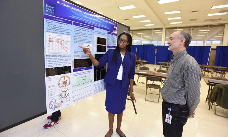 Summer Research student Precious Akujor reviews details of her research work with Dr. Frederick Periera